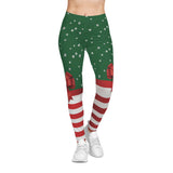 Green leggings with red and white pattern on a white background