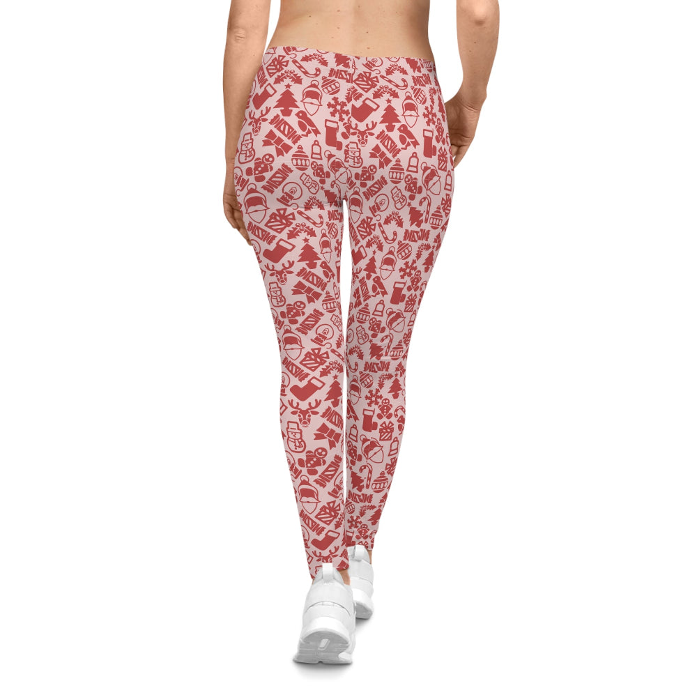 Red and white patterned leggings worn by a person on a white background