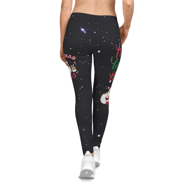Black leggings with festive designs on a white background
