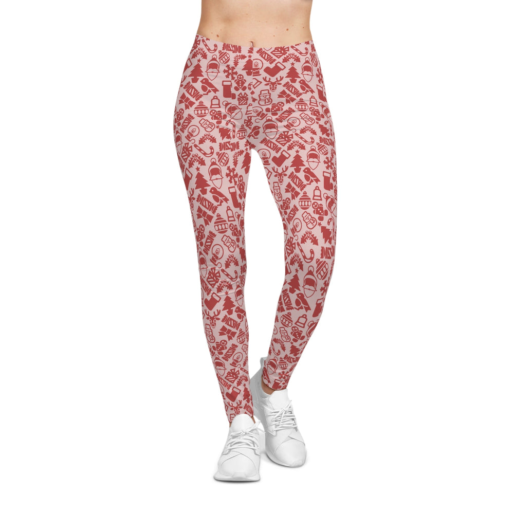 Red and white patterned leggings worn by a person on a white background