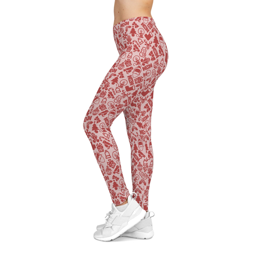 Red patterned leggings worn by a person on a white background