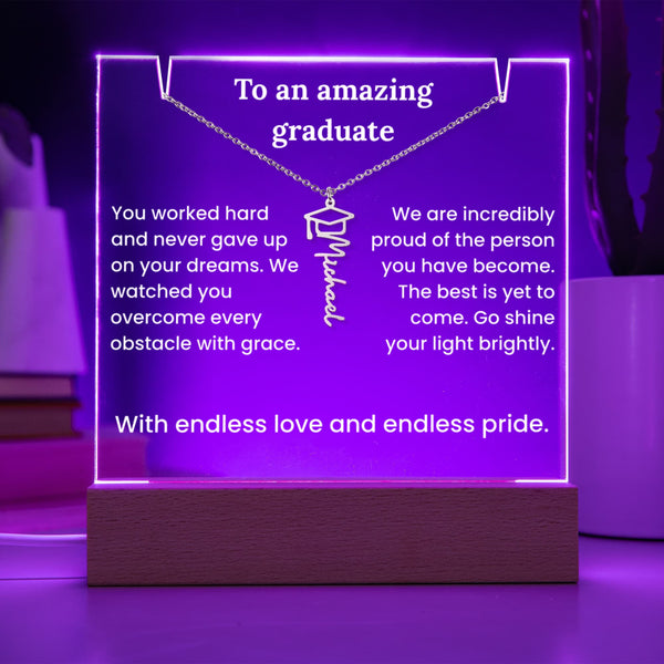 Glowing purple plaque with engraved message for a graduate