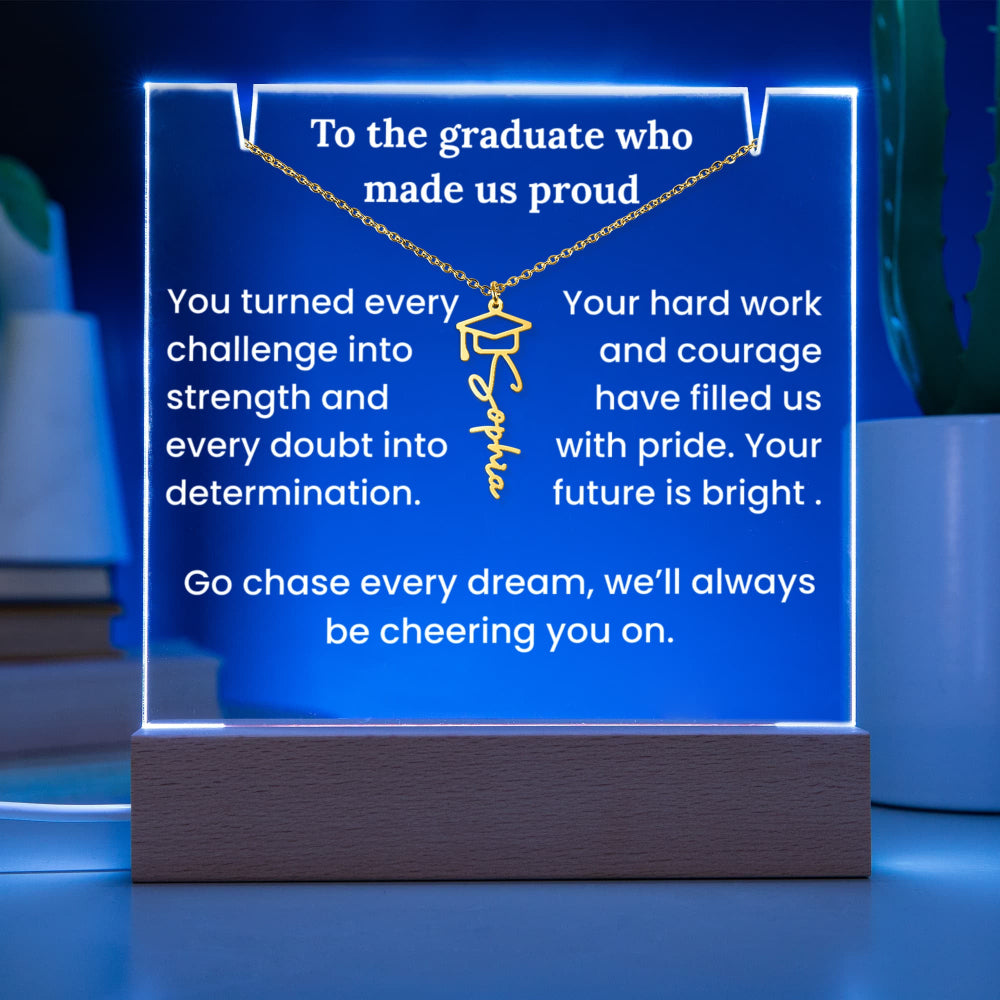 Decorative plaque with engraved message and necklace design on a blue background