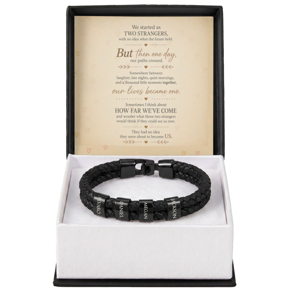 A black braided leather bracelet with a black metal clasp engraved with 'MORGAN', presented in an open white gift box with a black outer base. The inside lid features a printed sentimental poem on beige paper.