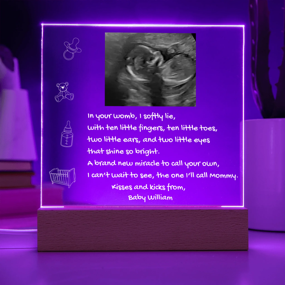 Decorative lamp with ultrasound photo and text on a purple background