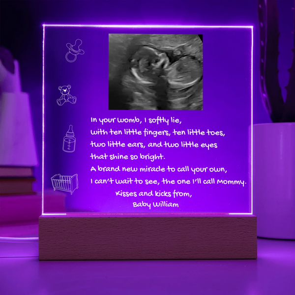 Decorative lamp with ultrasound photo and text on a purple background