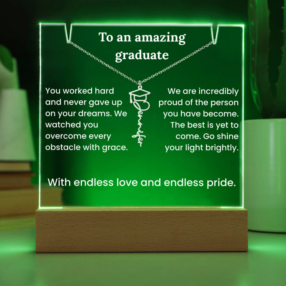 Decorative plaque with engraved message for a graduate on a green background