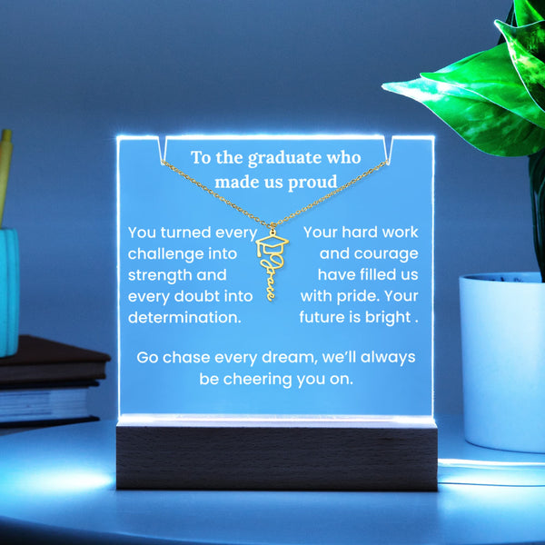 LED plaque with a necklace and graduation message on a blue background