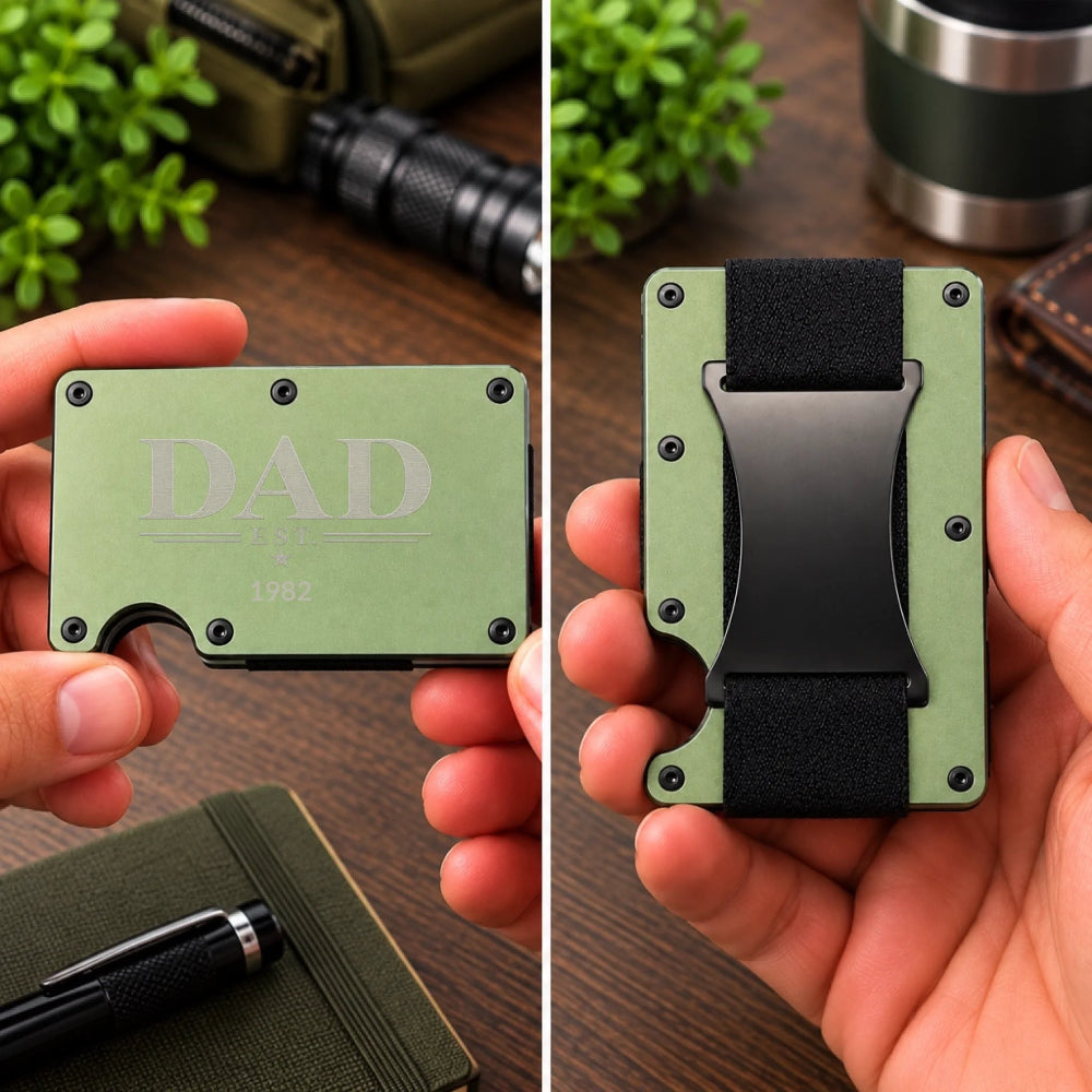 A split-screen close-up of a hand holding a slim metal wallet card. The left panel shows the front side with the engraved text 'DAD 1982', and the right panel shows the back side with a black belt clip and a light green body.