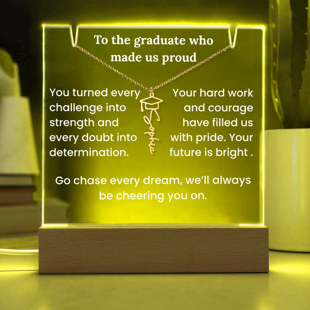 Decorative plaque with graduation-themed message and light-up design.