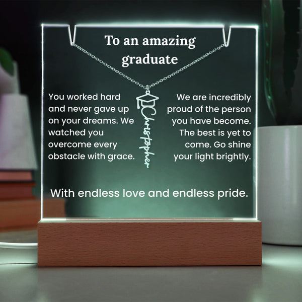 Decorative plaque with engraved message and necklace design, illuminated by LED lights.