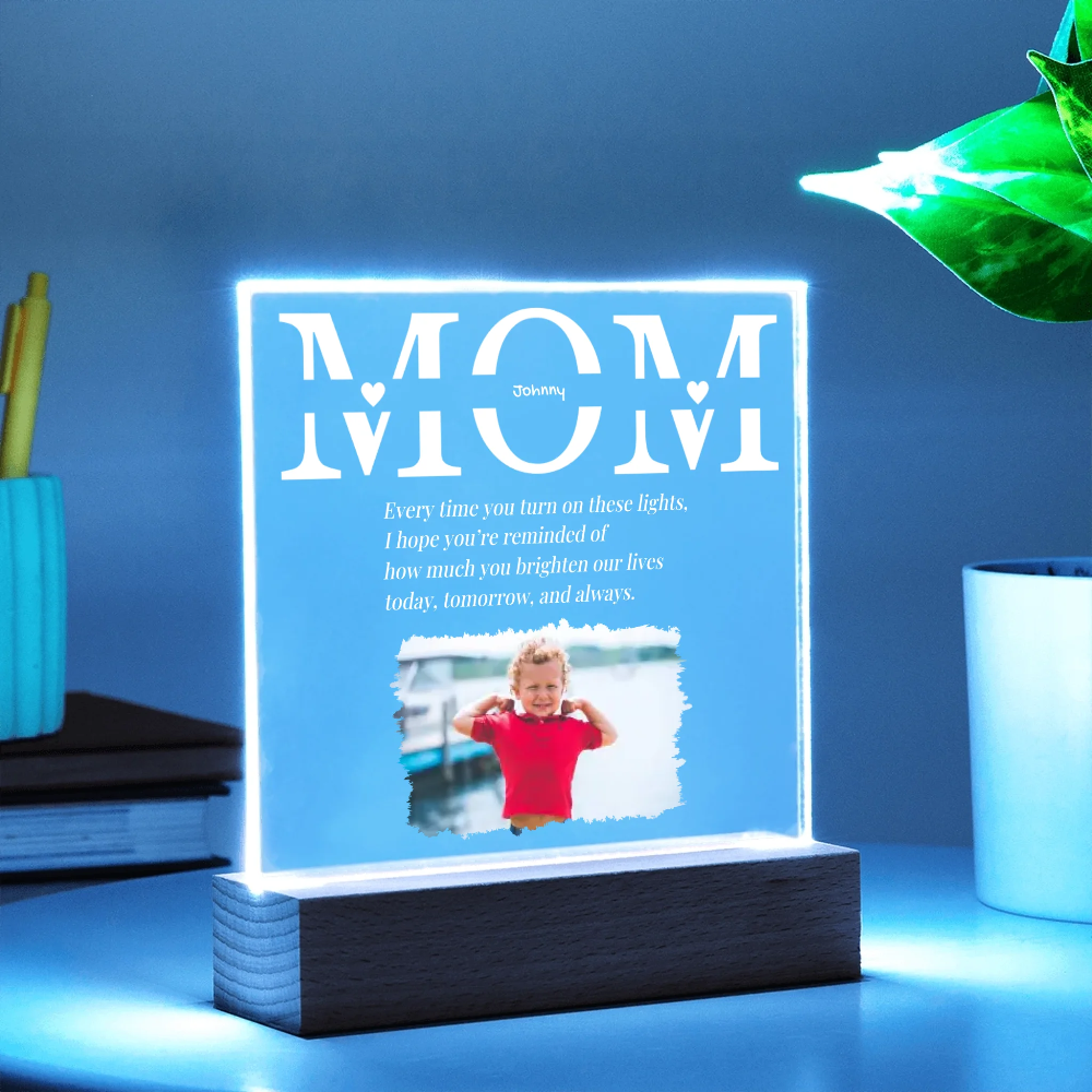 Decorative light with 'Mom' text and photo of a child on a blue background