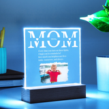 Decorative light with 'Mom' text and photo of a child on a blue background