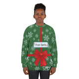Person wearing a green Christmas-themed sweater with a red bow and 'From Santa' label.