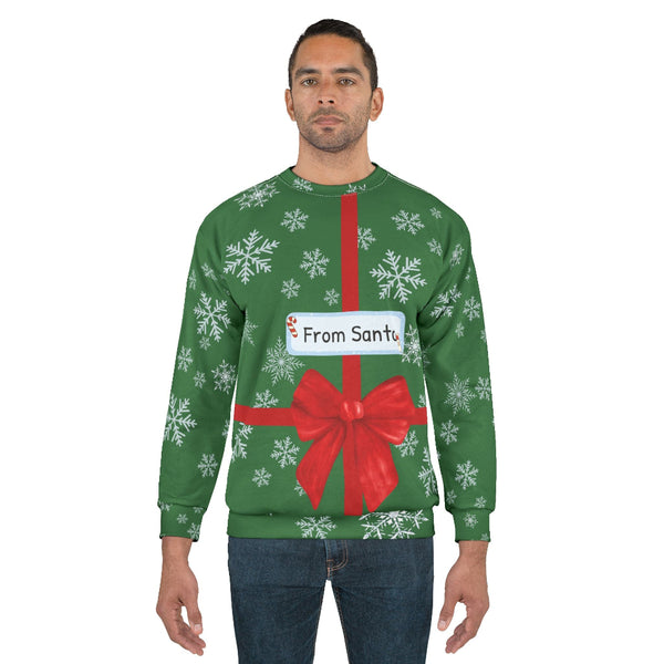 Man wearing a green Christmas sweater with a red bow and 'From Santa' label on a white background