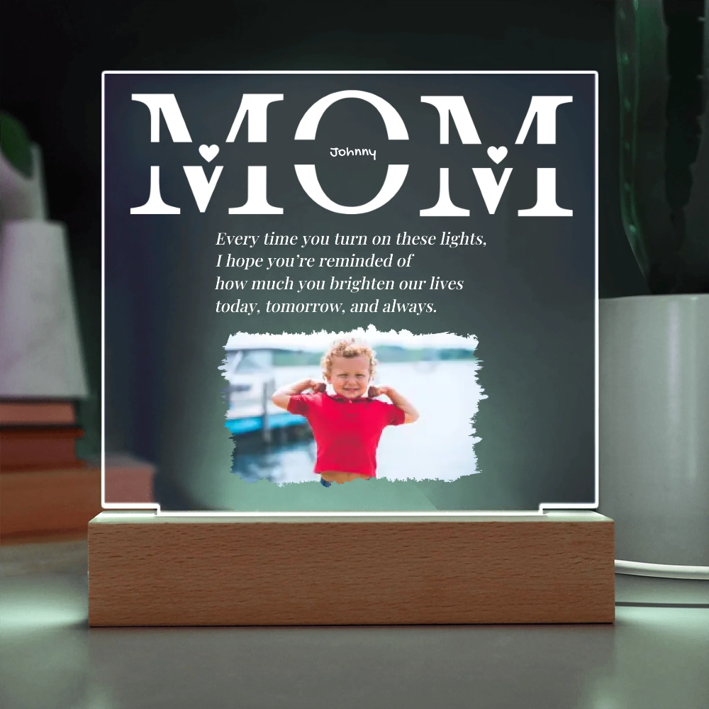 Personalized light with photo of a child and 'Mom' text on a dark background