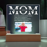 Personalized light with photo of a child and 'Mom' text on a dark background