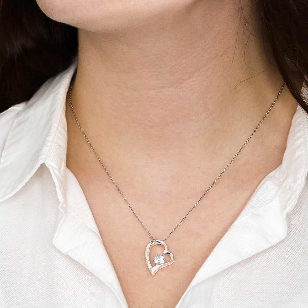 woman wearing white gold forever love necklace