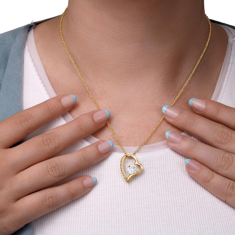 woman wearing yellow gold forever love necklace